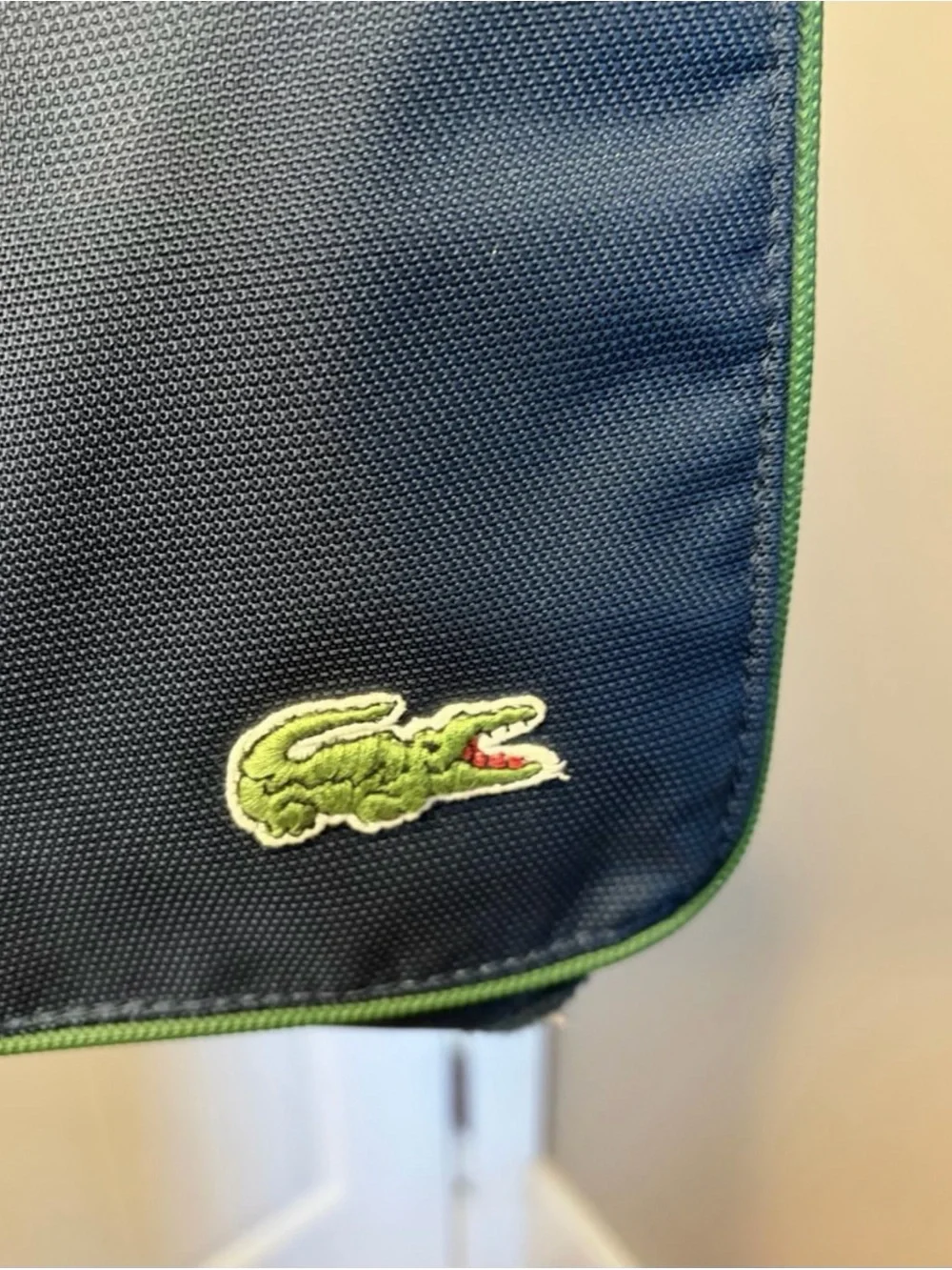 Lacoste Navy Messenger Bag with White Strap and Green Trim